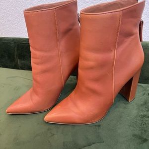 Cognac Steve Madden size 10 boot with a 4 1/2 heel height.